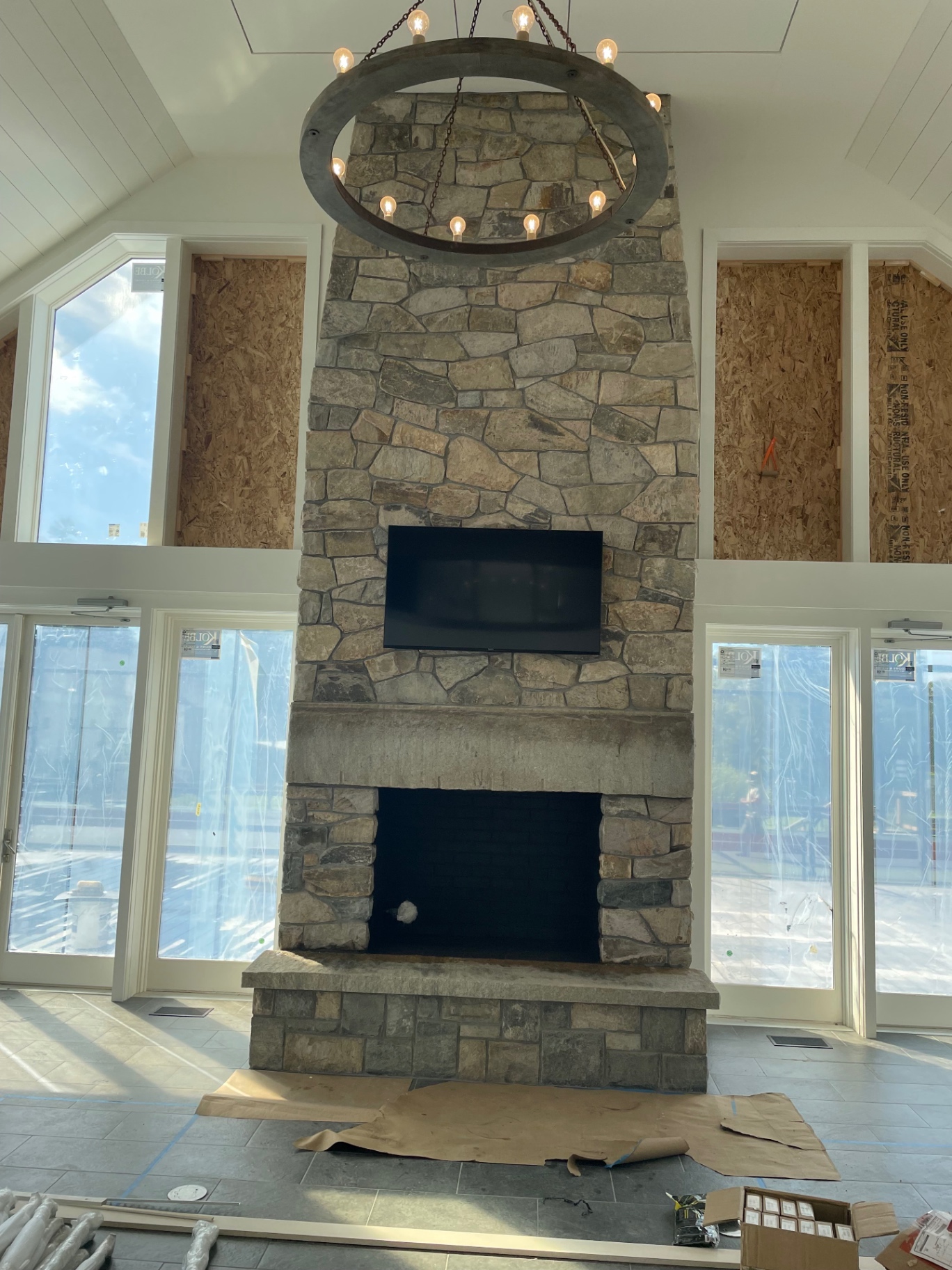 Floor-to-ceiling interior stone fireplace